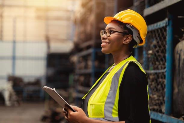 Site engineer wearing a hard hat and high-visibility vest